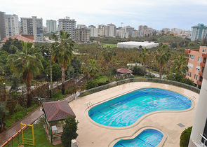 Квартира планировки 2+1 в районе Махмутлар