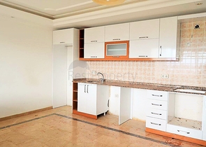 Квартира планировки 2+1 в районе Махмутлар