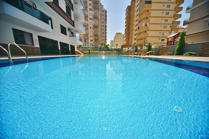 Квартира планировки 2+1 в новом комплексе Махмутлара