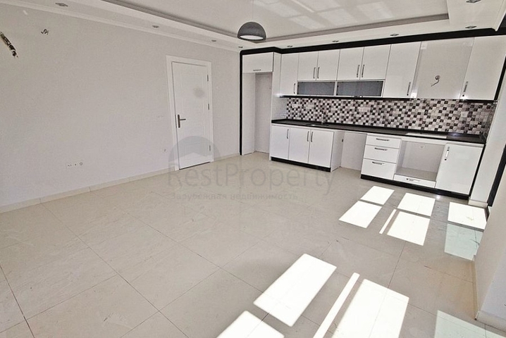 Квартира планировки 2+1 в новом комплексе Махмутлара