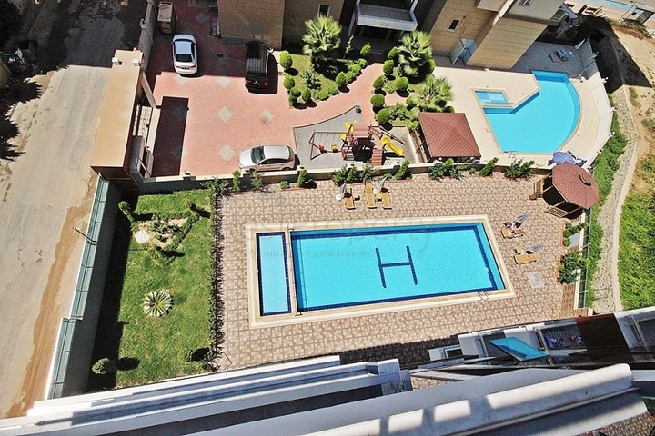 Квартира планировки 2+1 в новом комплексе Махмутлара