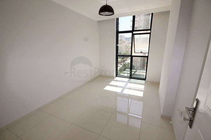 Квартира планировки 2+1 в новом комплексе Махмутлара