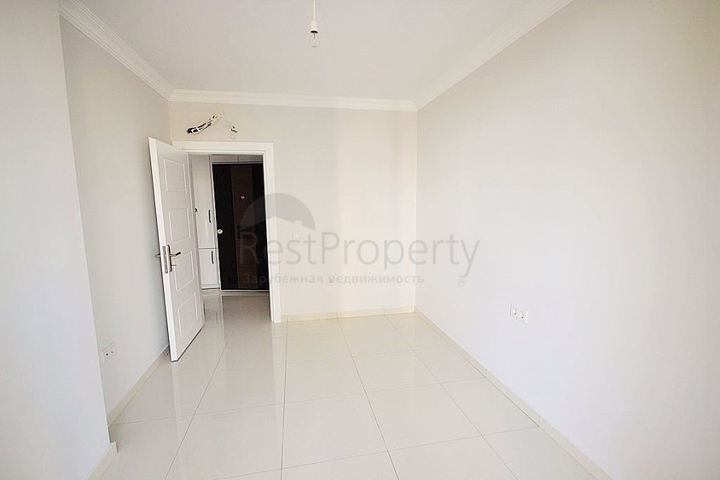 Квартира планировки 2+1 в новом комплексе Махмутлара