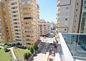 Квартира планировки 2+1 в новом комплексе Махмутлара