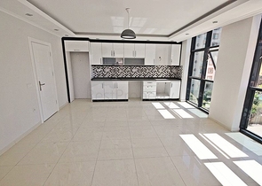 Квартира планировки 2+1 в новом комплексе Махмутлара