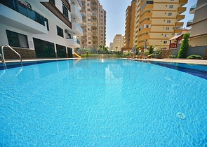 Квартира планировки 2+1 в новом комплексе Махмутлара