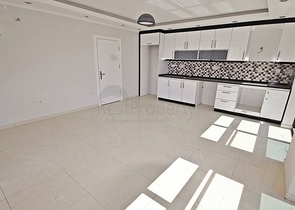 Квартира планировки 2+1 в новом комплексе Махмутлара