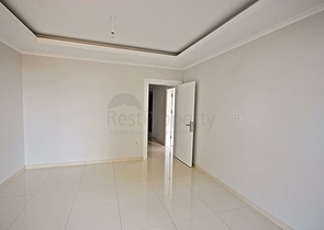 Квартира планировки 2+1 в новом комплексе Махмутлара