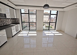 Квартира планировки 2+1 в новом комплексе Махмутлара