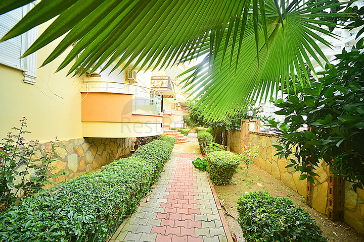 Трехкомнатная квартира в районе Махмутлар