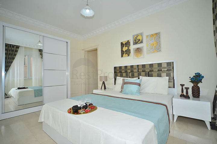 Трехкомнатная квартира в районе Махмутлар