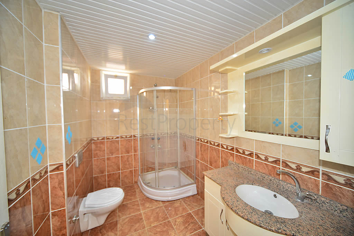 Трехкомнатная квартира в районе Махмутлар