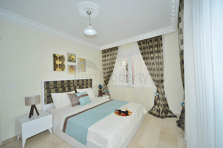 Трехкомнатная квартира в районе Махмутлар