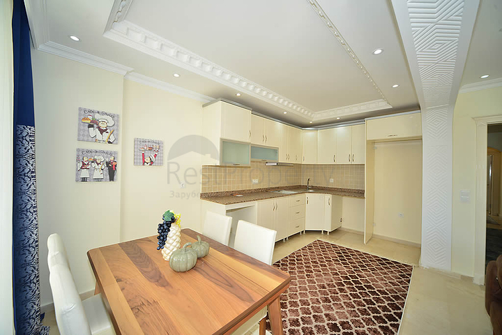 Трехкомнатная квартира в районе Махмутлар