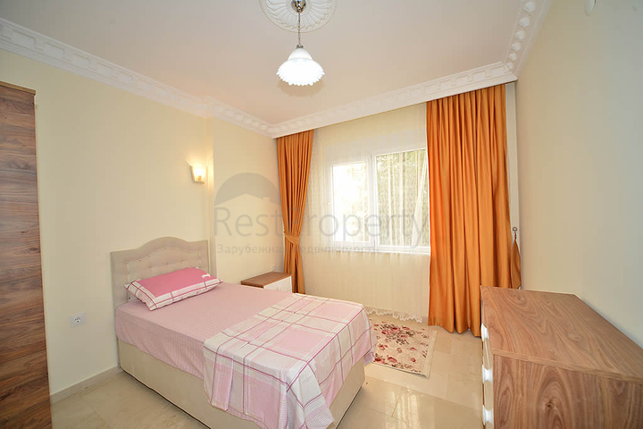 Трехкомнатная квартира в районе Махмутлар