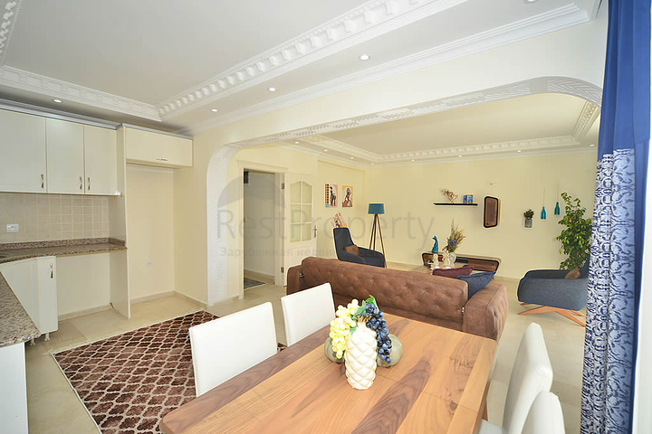 Трехкомнатная квартира в районе Махмутлар