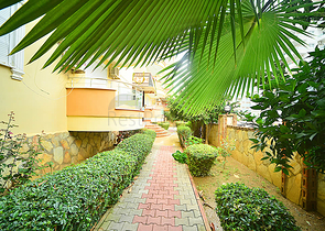 Трехкомнатная квартира в районе Махмутлар