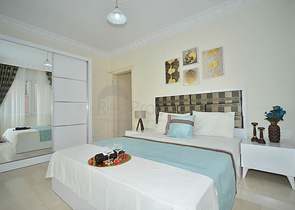 Трехкомнатная квартира в районе Махмутлар