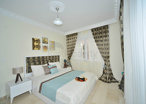 Трехкомнатная квартира в районе Махмутлар