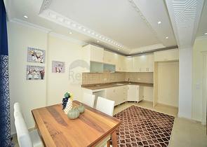 Трехкомнатная квартира в районе Махмутлар