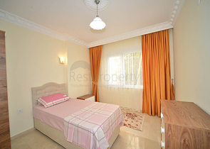 Трехкомнатная квартира в районе Махмутлар