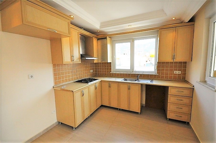 Квартира планировкой 2+1 в районе Махмутлар