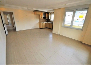 Квартира планировкой 2+1 в районе Махмутлар