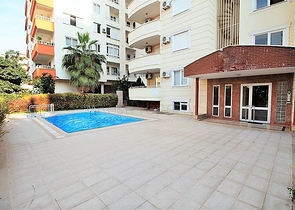 Квартира планировкой 2+1 в районе Махмутлар