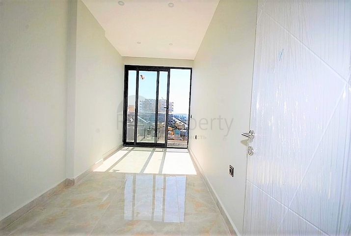 Квартира планировкой 2+1 с прямым видом на море