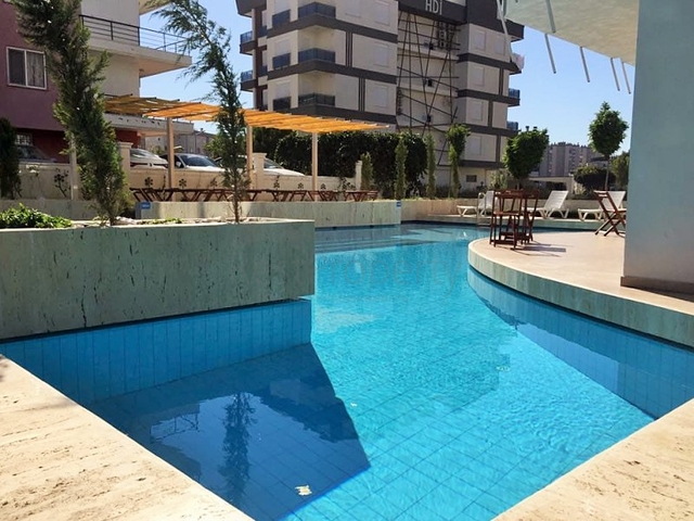 Квартира 1+1 с мебелью в Лимане Коньяалты Анталья