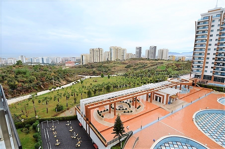 Квартира планировки 1+1 в современном комплексе Махмутлара