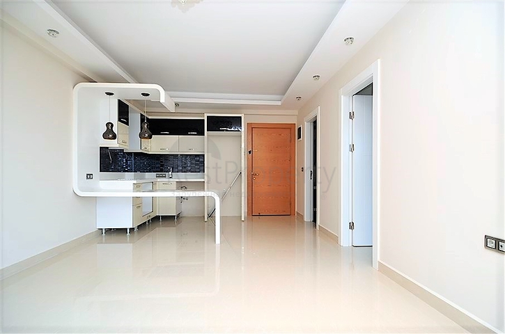 Квартира планировки 1+1 в современном комплексе Махмутлара