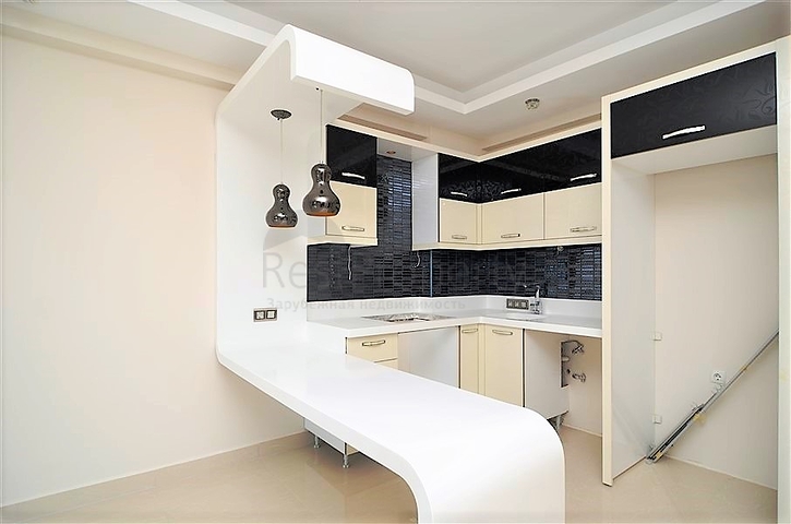 Квартира планировки 1+1 в современном комплексе Махмутлара