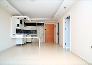 Квартира планировки 1+1 в современном комплексе Махмутлара