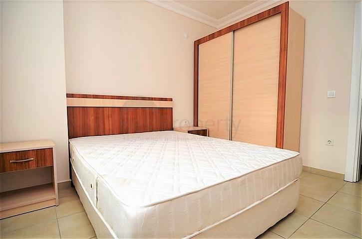 Меблированная квартира 1+1 в районе Махмутлар