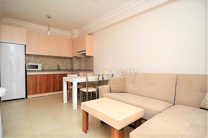 Меблированная квартира 1+1 в районе Махмутлар