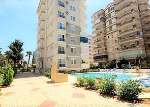 Меблированная квартира 1+1 в районе Махмутлар