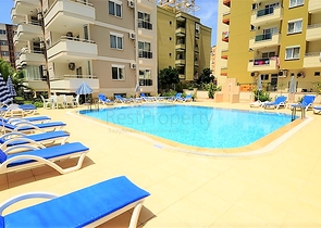 Меблированная квартира 1+1 в районе Махмутлар