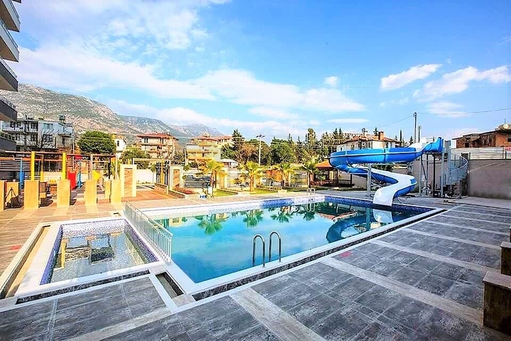 Меблированная квартира 1+1 в районе Махмутлар