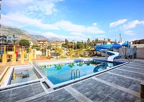 Меблированная квартира 1+1 в районе Махмутлар