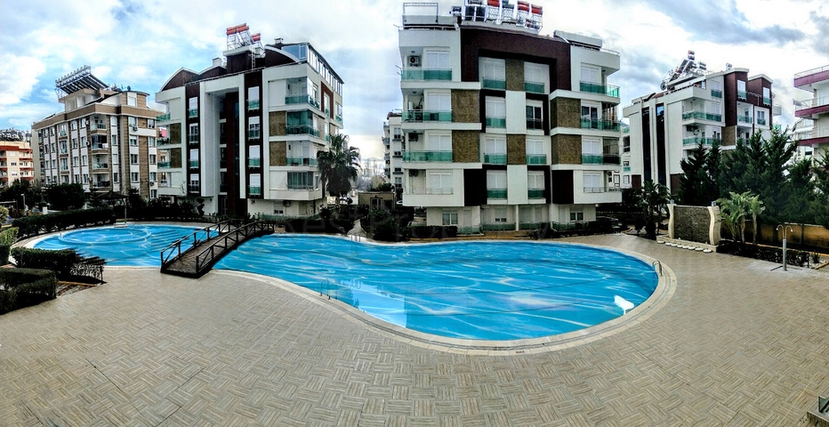 Квартира 1+1 с видом на бассейн в комплексе в Хурме Анталья