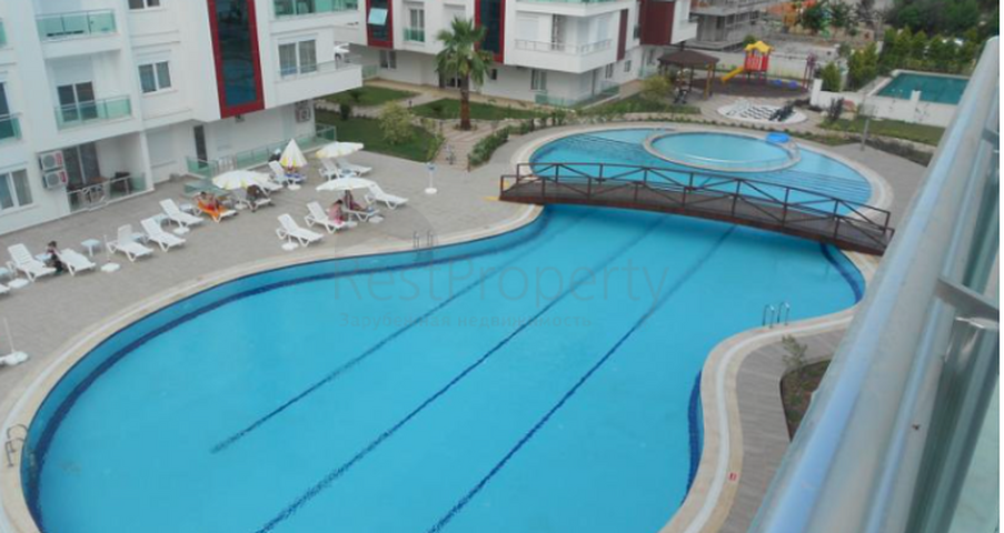 Квартира 1+1 с видом на бассейн в комплексе в Хурме Анталья