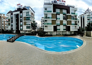 Квартира 1+1 с видом на бассейн в комплексе в Хурме Анталья