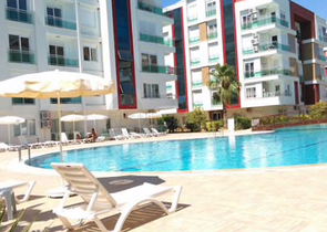 Квартира 1+1 с видом на бассейн в комплексе в Хурме Анталья