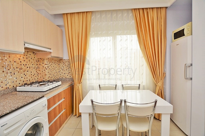 Меблированная квартира 1+1 в районе Махмутлар