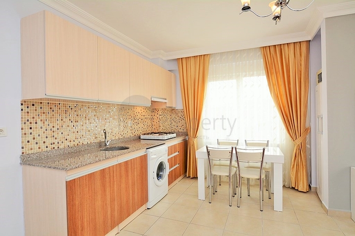 Меблированная квартира 1+1 в районе Махмутлар