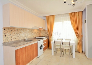 Меблированная квартира 1+1 в районе Махмутлар