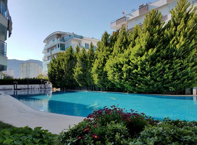 Квартира 1+1 с мебелью в Лимане Коньяалты 800 м до моря