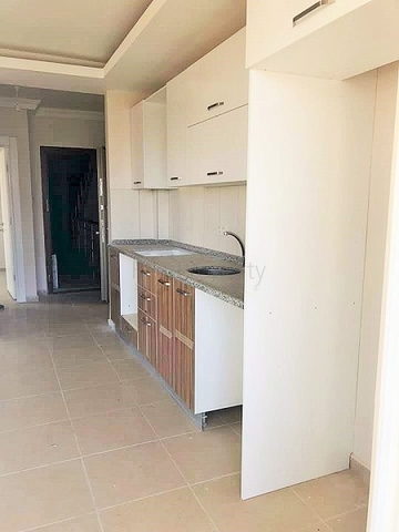 Двухкомнатная квартира в Махмутларе по выгодной цене