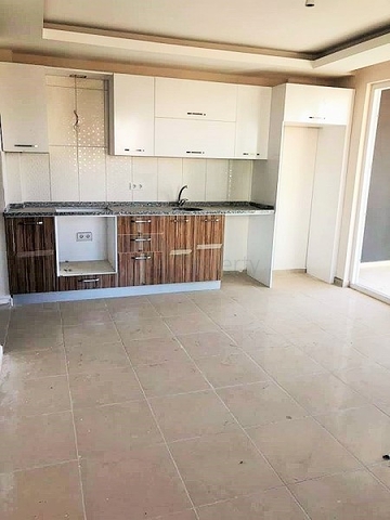 Двухкомнатная квартира в Махмутларе по выгодной цене